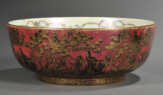 Designer Daisy Makeig-Jones wrote a complete history for the amusing Firbolgs, who caper around this red-ground Imperial bowl (10 7/8 inches diameter), circa 1920. With interior views from the story of Thumbelina, the bowl sold last July for $5,036. Image courtesy of Skinner Inc.